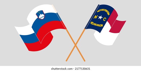 Crossed and waving flags of Slovenia and The State of North Carolina. Vector illustration
