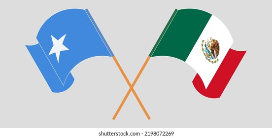 Crossed and waving flags of Somalia and Mexico. Vector illustration
