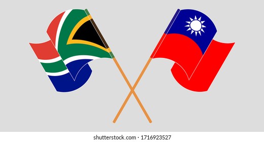 Crossed and waving flags of South Africa and Taiwan