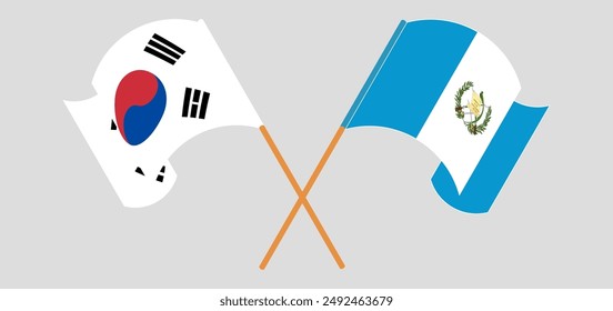 Crossed and waving flags of South Korea and Republic of Guatemala. Vector illustration
