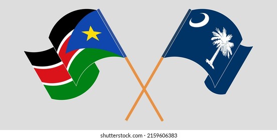 Crossed and waving flags of South Sudan and The State of South Carolina. Vector illustration
