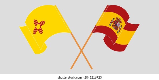 Banderas cruzadas y ondeando banderas de España y del Estado de Nuevo México