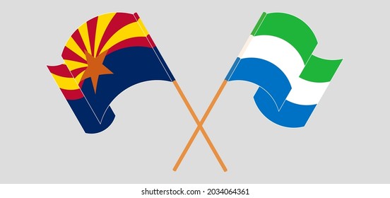 Crossed and waving flags of the State of Arizona and Sierra Leone