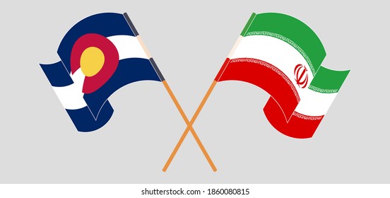 Crossed and waving flags of The State of Colorado and Iran