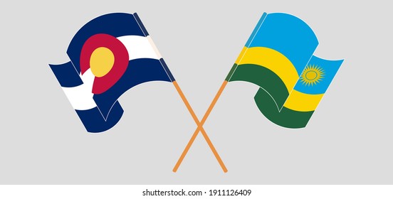 Überquerte und wehende Flaggen des Staates Colorado und Ruandas