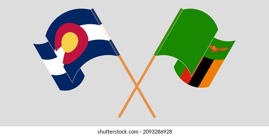 Crossed and waving flags of The State of Colorado and Zambia. Vector illustration
