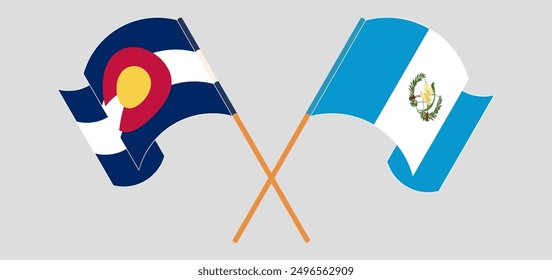 Crossed and waving flags of The State of Colorado and Republic of Guatemala. Vector illustration
