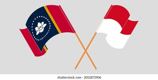 Crossed and waving flags of The State of Mississippi and Monaco
