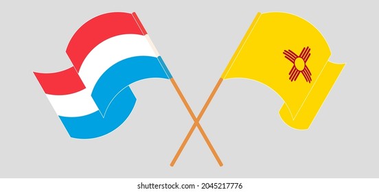 Crossed and waving flags of the State of New Mexico and Luxembourg