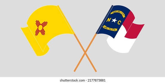 Crossed and waving flags of the State of New Mexico and The State of North Carolina. Vector illustration
