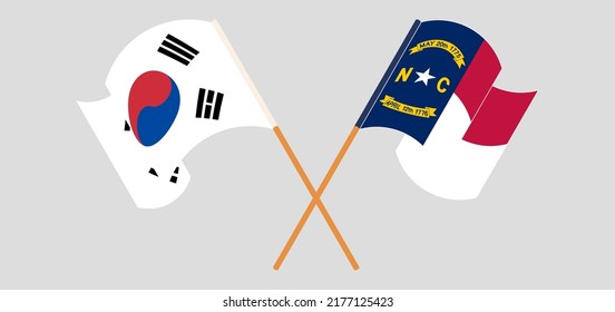 Crossed and waving flags of The State of North Carolina and South Korea. Vector illustration
