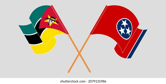 Crossed and waving flags of The State of Tennessee and Mozambique. Vector illustration
