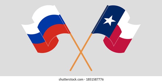 Crossed and waving flags of the State of Texas and Russia