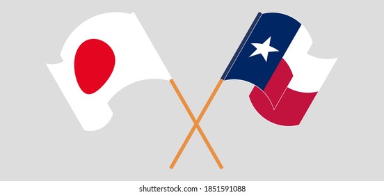 Crossed and waving flags of the State of Texas and Japan