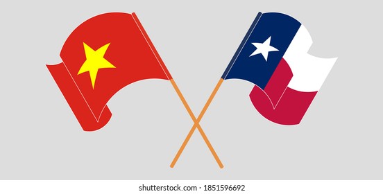 Crossed and waving flags of the State of Texas and Vietnam