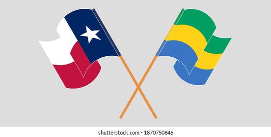 Banderas cruzadas y ondeando banderas del Estado de Texas y el Gabón