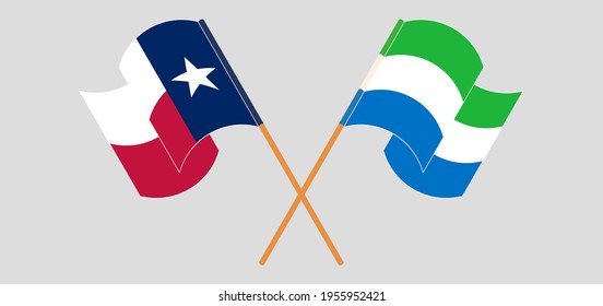 Crossed and waving flags of the State of Texas and Sierra Leone