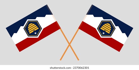 Crossed and waving flags of The State of Utah. Vector illustration
