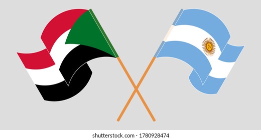 Crossed and waving flags of Sudan and Argentina