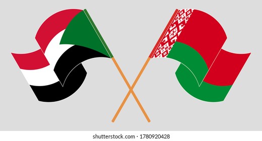 Überquerte und wehende Flaggen von Sudan und Belarus