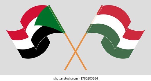 Crossed and waving flags of Sudan and Hungary