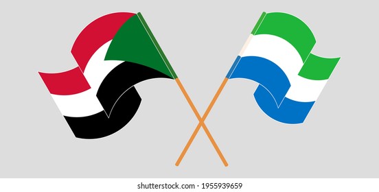 Crossed and waving flags of the Sudan and Sierra Leone