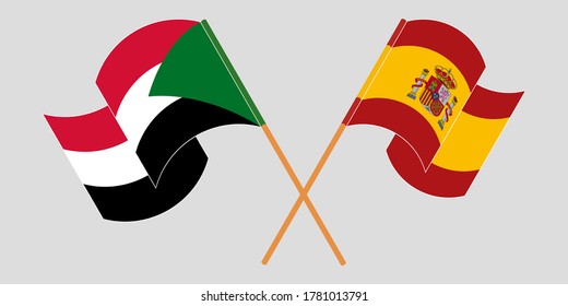 Crossed and waving flags of Sudan and Spain