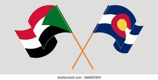 Überquerte und wehende Flaggen des Sudan und des Staates Colorado
