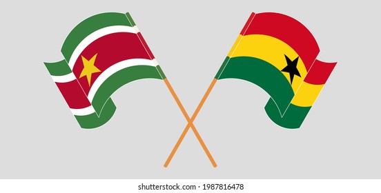 Crossed and waving flags of Suriname and Ghana