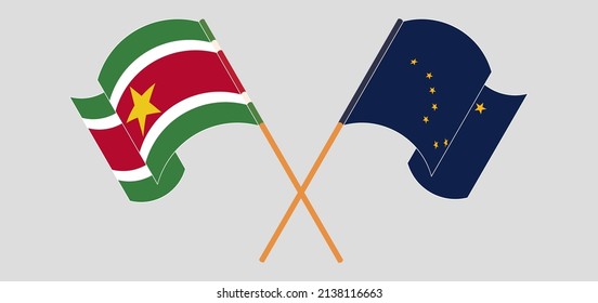Crossed and waving flags of Suriname and the State of Alaska. Vector illustration
