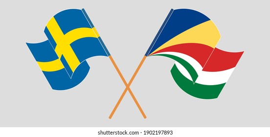 Crossed and waving flags of Sweden and Seychelles