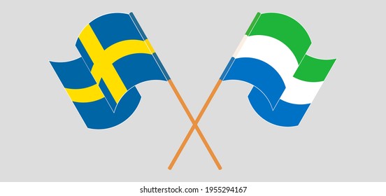 Crossed and waving flags of Sweden and Sierra Leone