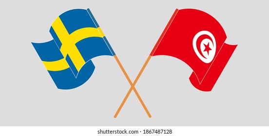 Crossed and waving flags of Sweden and Tunisia