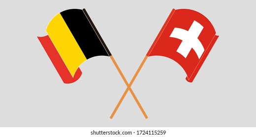 Crossed and waving flags of Switzerland and Belgium