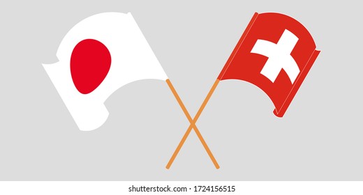 Crossed and waving flags of Switzerland and Japan