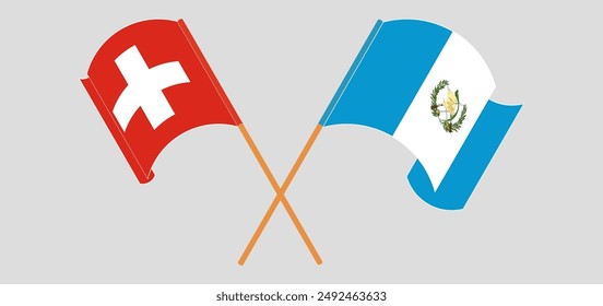 Crossed and waving flags of Switzerland and Republic of Guatemala. Vector illustration
