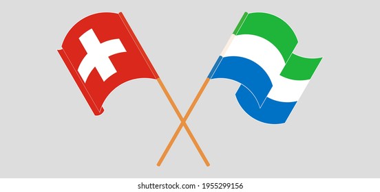 Crossed and waving flags of Switzerland and Sierra Leone