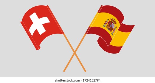 Crossed and waving flags of Switzerland and Spain