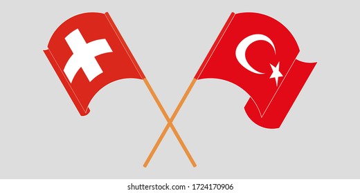 Crossed and waving flags of Switzerland and Turkey