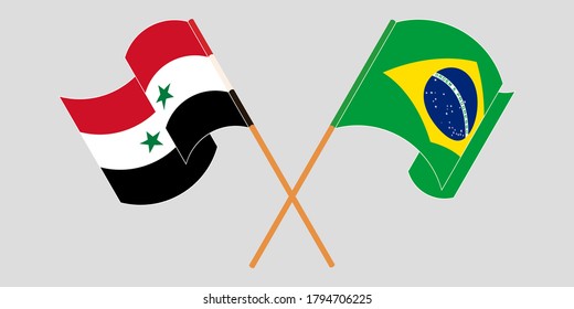 Crossed and waving flags of Syria and Brazil
