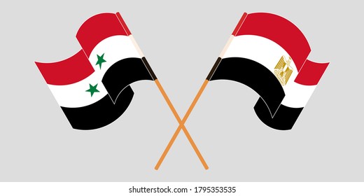 Crossed and waving flags of Syria and Egypt