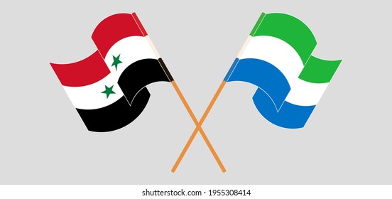 Crossed and waving flags of Syria and Sierra Leone