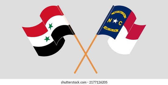 Crossed and waving flags of Syria and The State of North Carolina. Vector illustration
