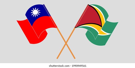 Crossed and waving flags of Taiwan and Guyana