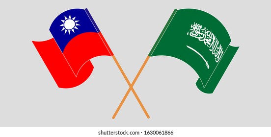Crossed and waving flags of Taiwan and the Kingdom of Saudi Arabia