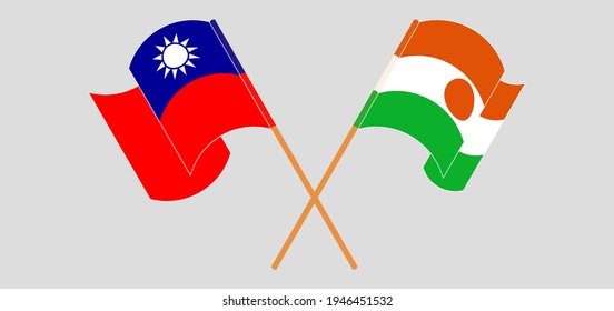 Crossed and waving flags of Taiwan and Niger