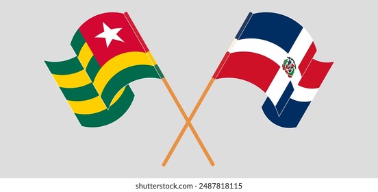 Crossed and waving flags of Togo and Dominican Republic. Vector illustration
