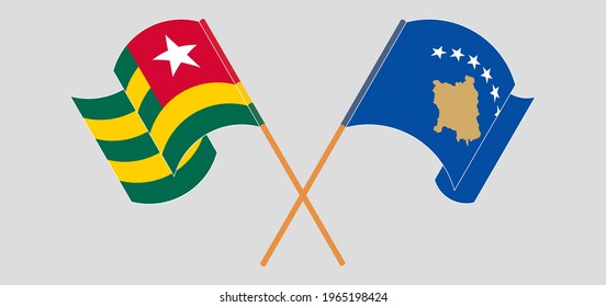 Crossed and waving flags of Togo and Kosovo