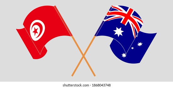 Crossed and waving flags of Tunisia and Australia