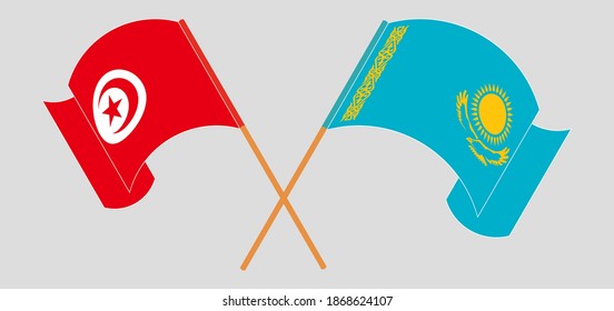 Crossed and waving flags of Tunisia and Kazakhstan